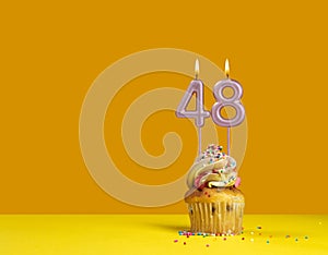 Birthday celebration with cupcake - Candle number 48