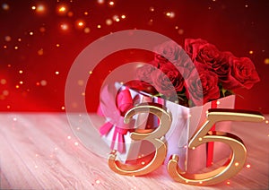 Birthday concept with red roses in the gift on wooden desk. thirtyfifth. 35th. 3D render