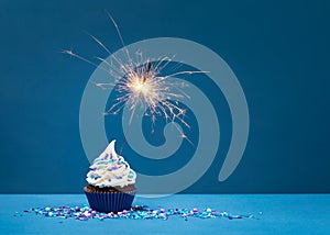 Birthday Cupcake on blue with sparkler