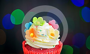 Birthday cupcake with a single blue candle.Cupcake with yellow cream and heart for love valentines.green crown cupcakes with cream