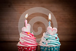 Birthday cupcake with sweet heart shape of marshmallow