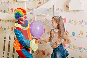 Birthday entertainment with clown.