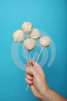 Birthday food - cake pop. White chocolate sweets on stick