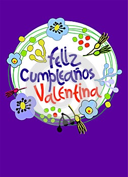 Birthday greeting card in Spanish. Text says Happy Birthday Valentina. Hand lettering with colorful floral decoration photo