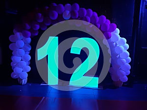 12 birthday balloon arch photo