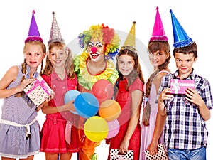 Birthday party group of teen with clown.