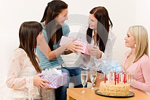 Birthday party - woman getting present, surprise