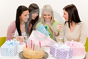Birthday party - woman unwrap present, celebrating