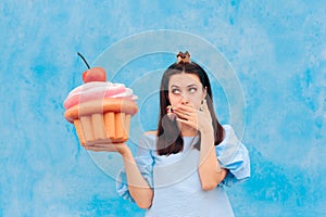Birthday Woman Eating Cupcake Feeling Sick photo
