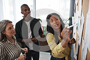 A birthright, an inheritance, a legacy. Side shot of a group of businesspeople brainstorming and sharing ideas on a photo