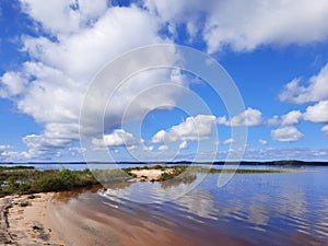Biscarrosse sandy wild beach with blue calm water in landes france photo