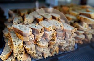 Biscotti on display in a store window.