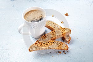 Biscotti. Traditional Italian almond cookies with a cup of coffee