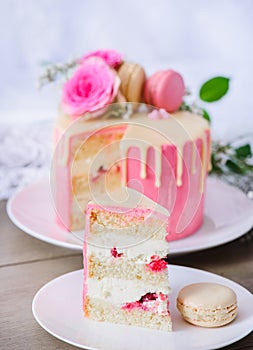 Biscuit cake with buttercream and raspberries