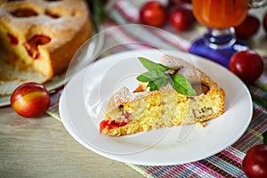 Biscuit cake with cherry plums