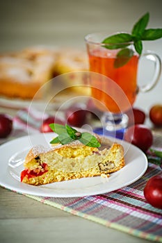 Biscuit cake with cherry plums
