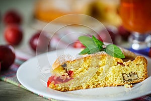 Biscuit cake with cherry plums