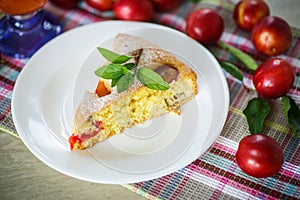 Biscuit cake with cherry plums