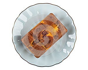 Biscuit with chocolate in saucer isolated on white background. Top view