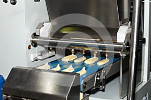 Biscuit depositing machine