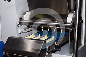 Biscuit depositing machine