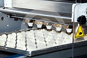 Biscuit depositing machine
