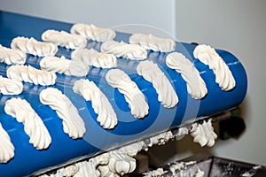 Biscuit depositing machine