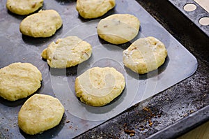 Biscuits on a baking sheet metal