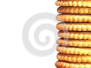 BISCUITS - A stack of delicious round biscuits isolated on white background with copy space for text