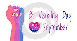 Bisexuality day concept vector. Hand is painted in bisexual pride colors. Heart with pink stripes and 23 September is written. Bi photo