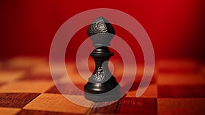 Bishop black chess piece with red background on turntable