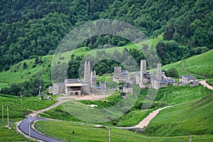 Bisht mountain settlement with ancient stone towers photo