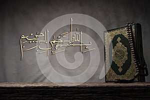 Bismillah - Mean In The Name Of Allah Arabic art  with Koran - holy book of Muslims  public item of all muslims