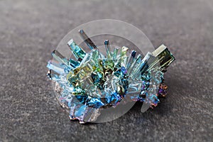 Bismuth crystals on a dark background. This is the most strongly diamagnetic element and also the heaviest that is not radioactive