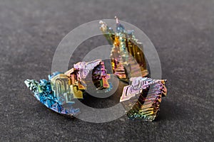 Bismuth crystals on a dark background. This is the most strongly diamagnetic element and also the heaviest that is not radioactive