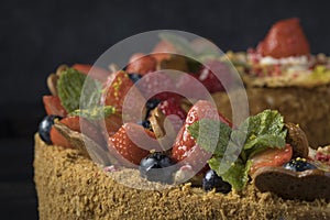 Bisquit cake with cream strawberry and sugar powder