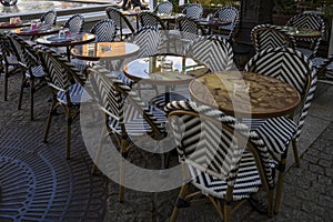 A bistro and restaurant table ready to serve customers and clients photo