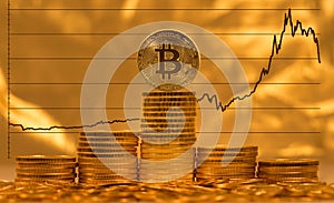 Bitcoin against background of price graph