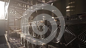 Bitcoin ASIC miners in warehouse. ASIC mining equipment on stand racks for mining cryptocurrency in steel container