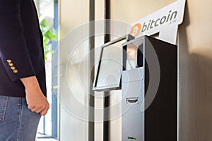 Bitcoin atm and businessman