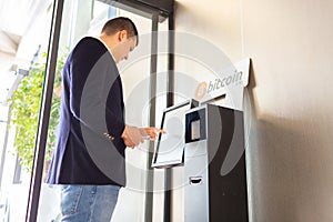 Bitcoin atm and businessman