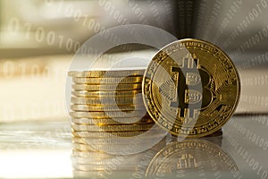 Bitcoin with Binary Codes - Stock Image