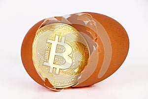Bitcoin in broken egg.