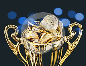 Bitcoin BTC coins on trophy