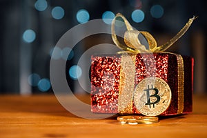 Bitcoin BTC cryptocurrency and Christmas gift box