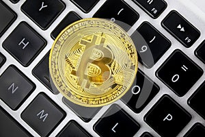 Bitcoin BTC, XBT, cryptocurrency currency and keyboard.