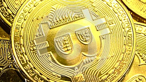 Bitcoin cash gold coins rotate smoothly in a circle. Close up