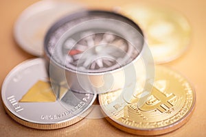 Bitcoin coin and compass.