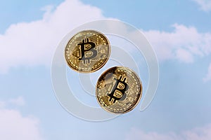 Bitcoin coin on sky background.Business finance investment. Digital technology concept. Business success concept wealth