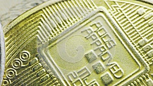 bitcoin coins lie on a dollar bill